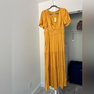 Anthropologie silk The Somerset Maxi dress. Marigold colored. New with tags.